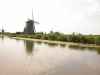 eva windmills water waterside reflection dutch the netherlands wind