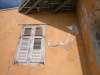 architecture exteriors window shades weathered jacco curacao wall cracks cracked