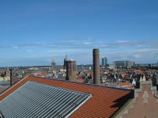 maartent amsterdam citscape roof roofs buildings chimney skyline