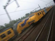 train trains vehicles land blur blurs dutch rail railroad tracks diagonal