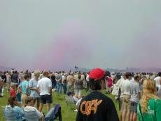 crowd people crash airshow summer backs field grass
