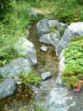 maartent brook garden stream rock babbling flowing
