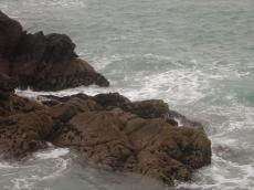 cliff water sea coast rock exterior