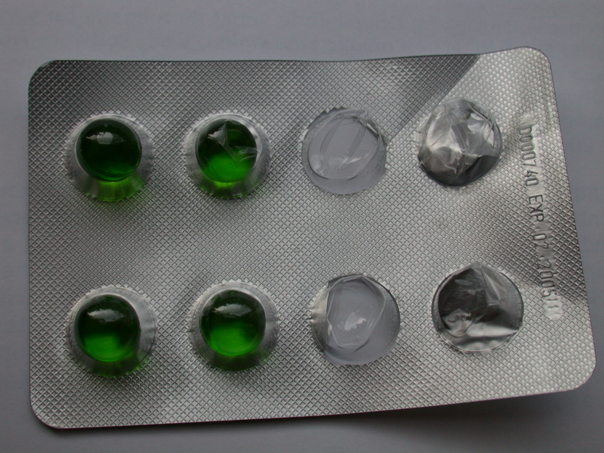 Image*After image green pills medicine strip of pills