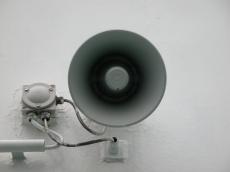 objects speaker sound audio megaphone circle circles white metal plastic wires gray front
