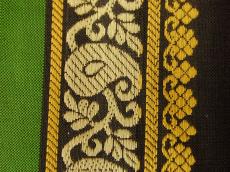 weave silk batik wove fabric clothe pattern texture green yellow black