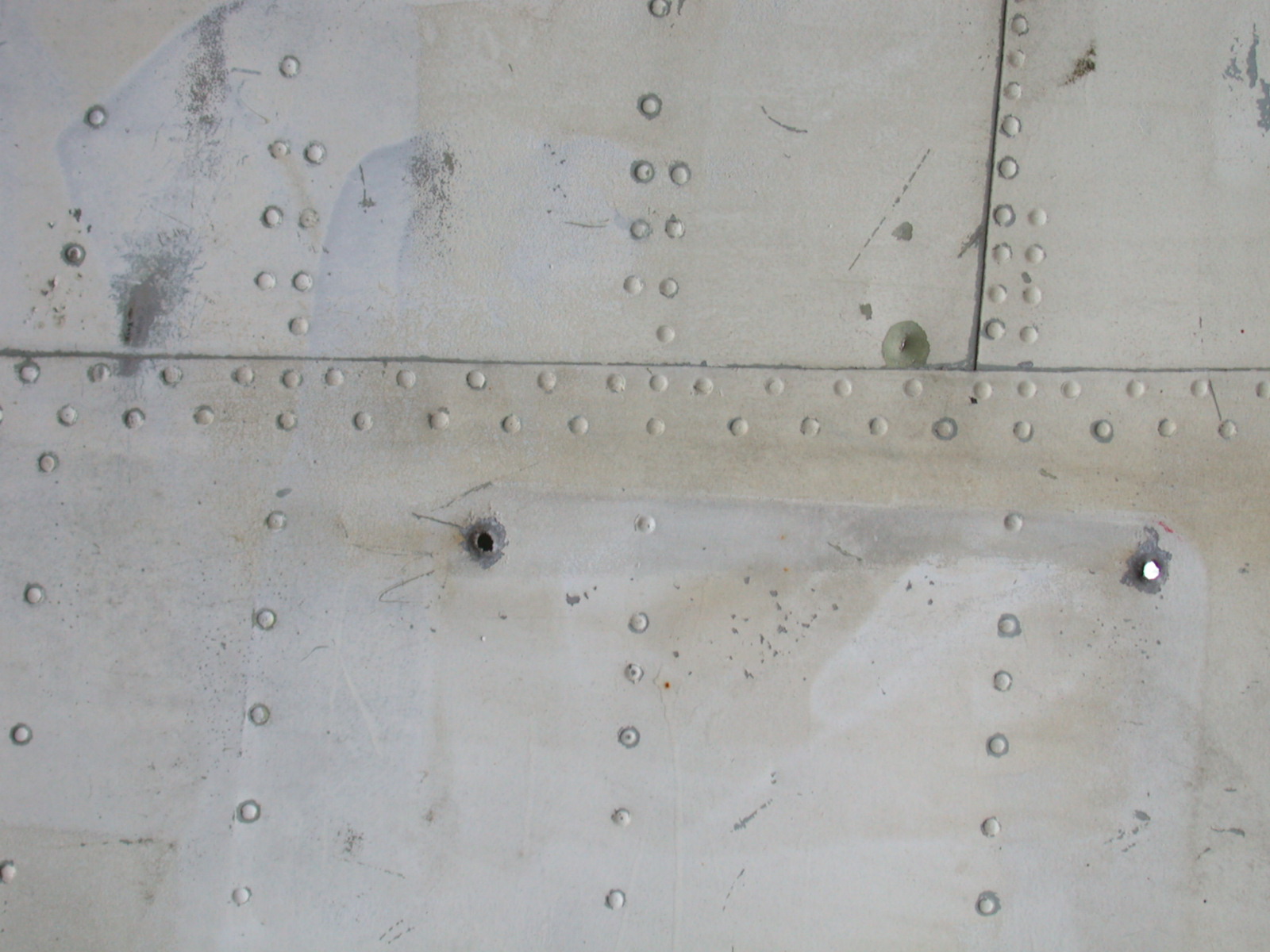 Image*After photo metal plate plates rivet rivets bolts wing