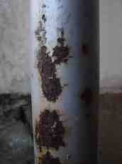 poows rusty pole rust spots metal steel