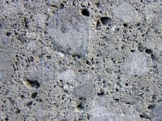 macro stone concrete hole pattern texture wall ground floor grey gray