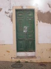 door in old wall plaster