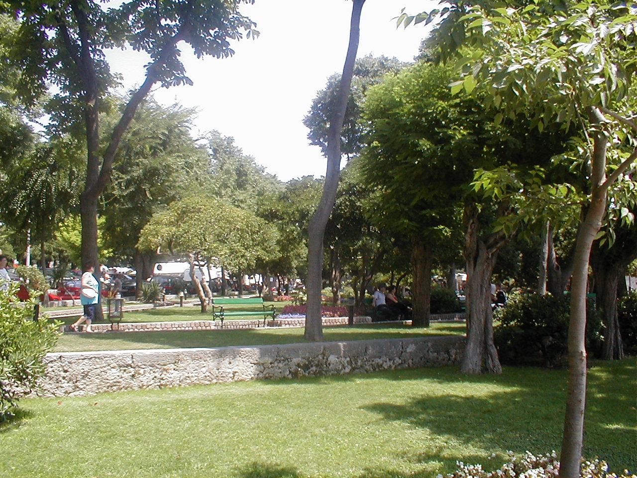 dario park outside people wandering warm summer summer's day