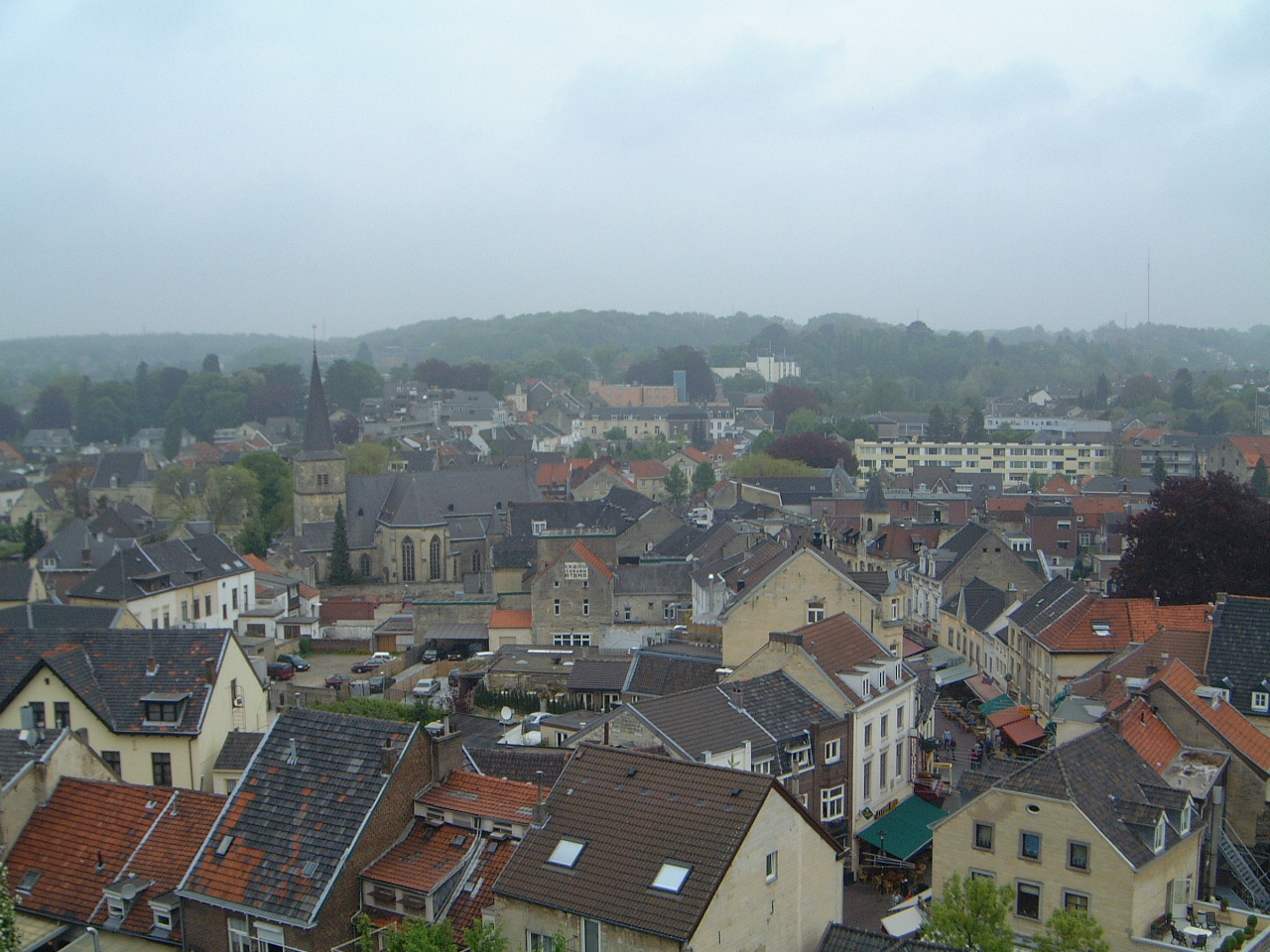 maartent city scape roofs town european cris cross streets