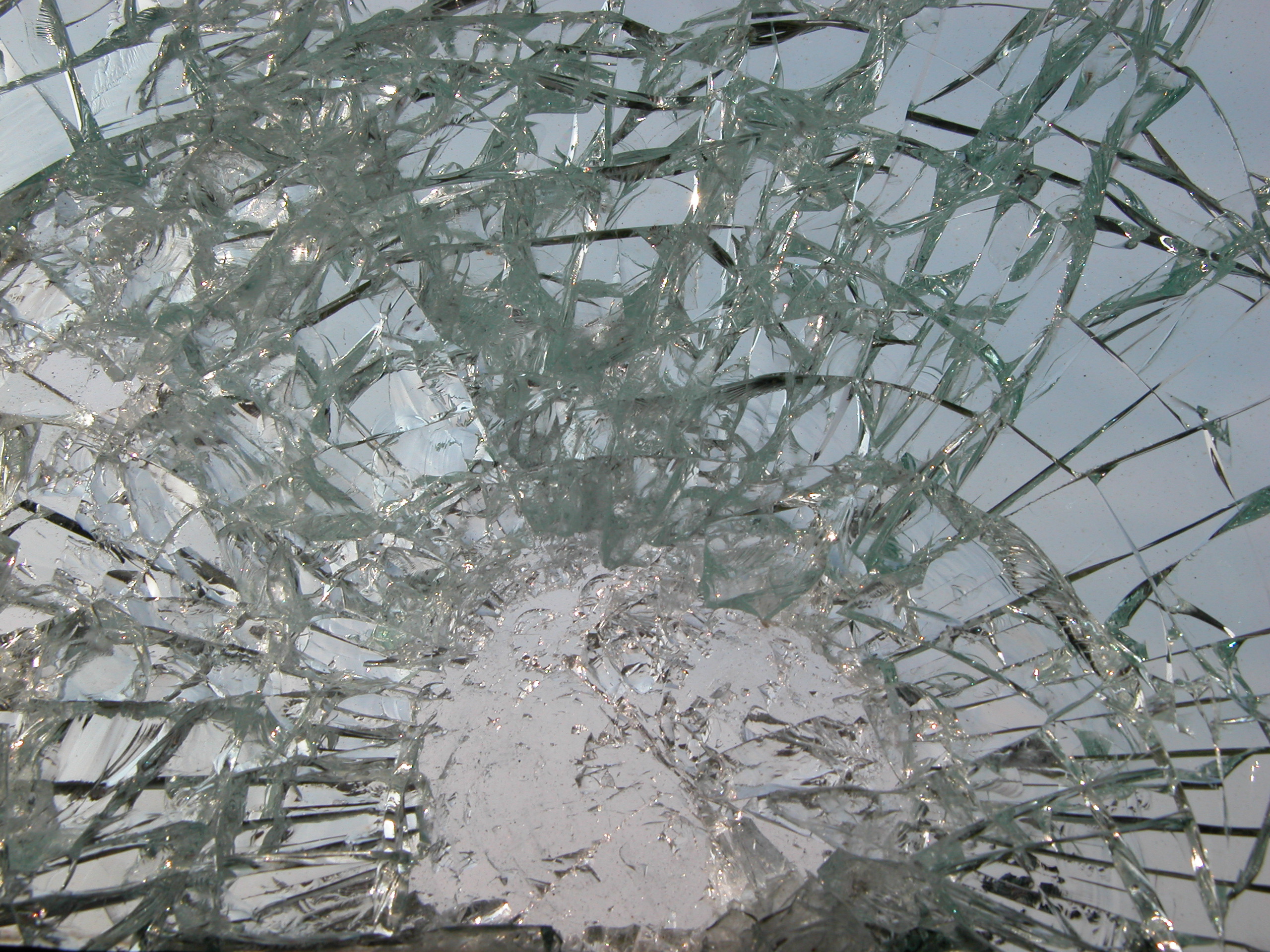 crack in glass window pane star impact
