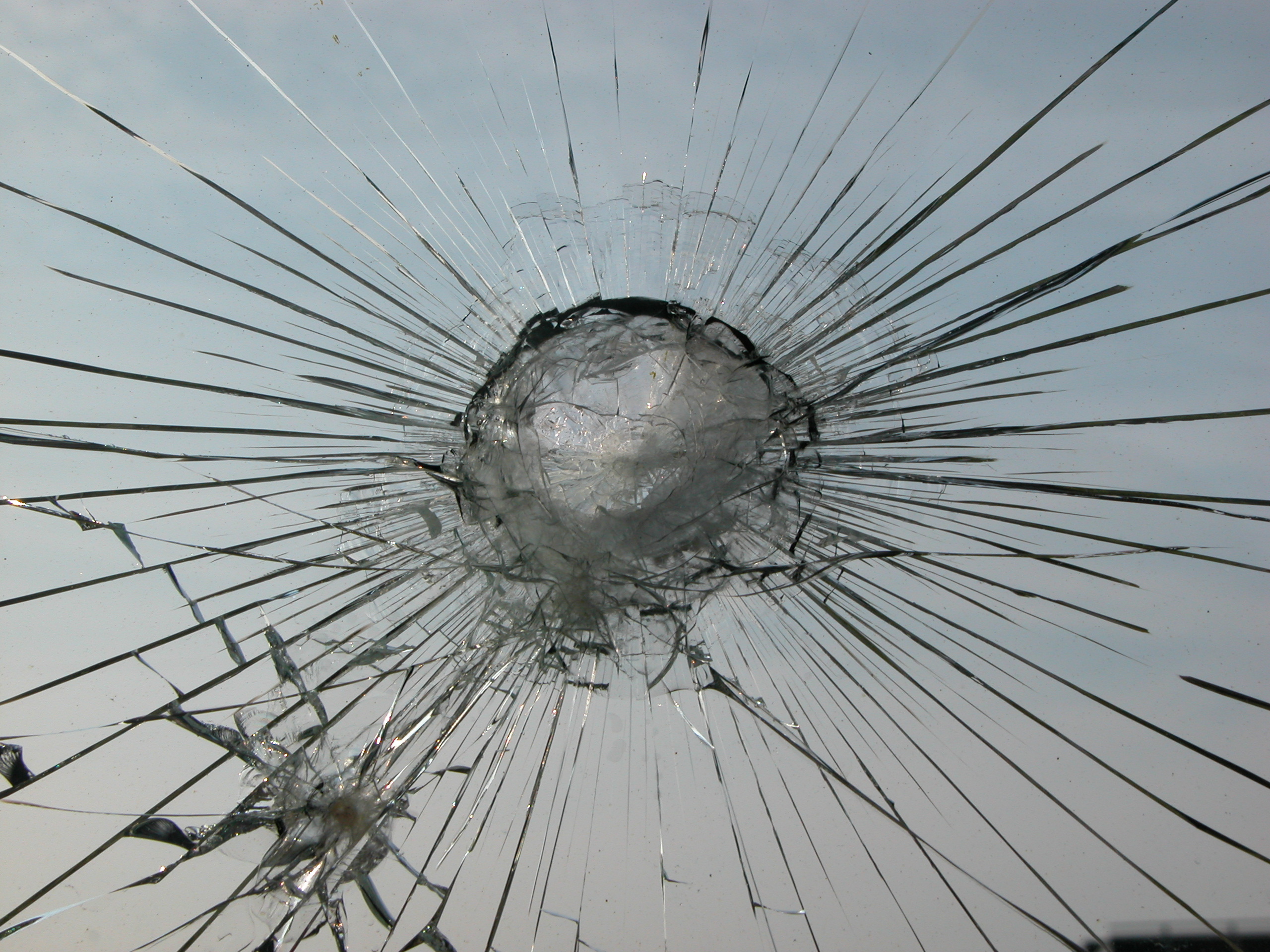 crack splintered glass window car windshield