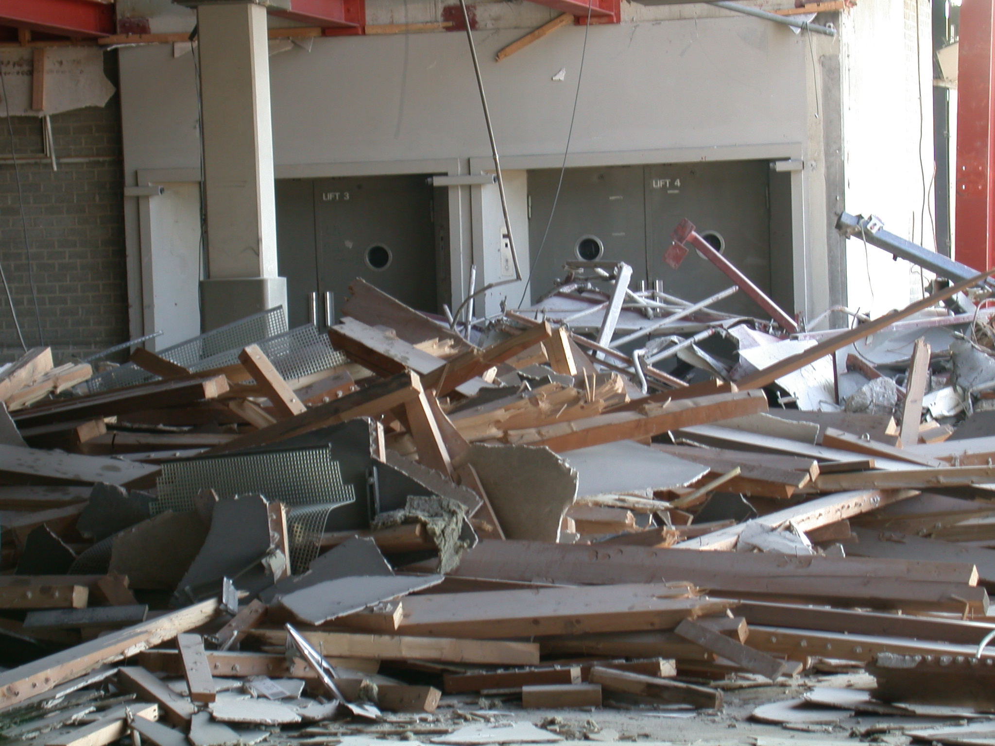 rubble earthquake rubbish planks caved in room debris derelict office