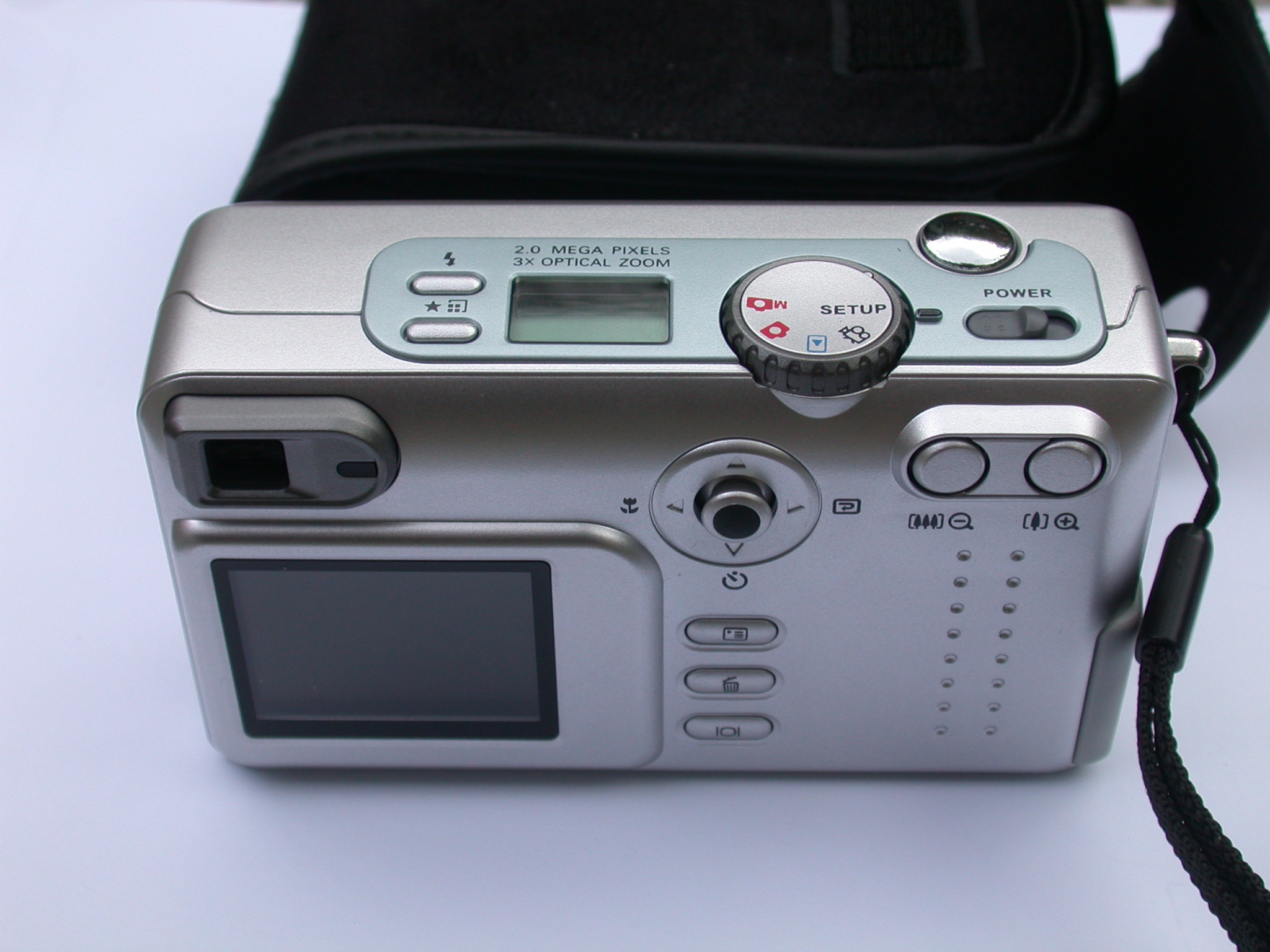 digital camera photos shoot dials buttons silver display