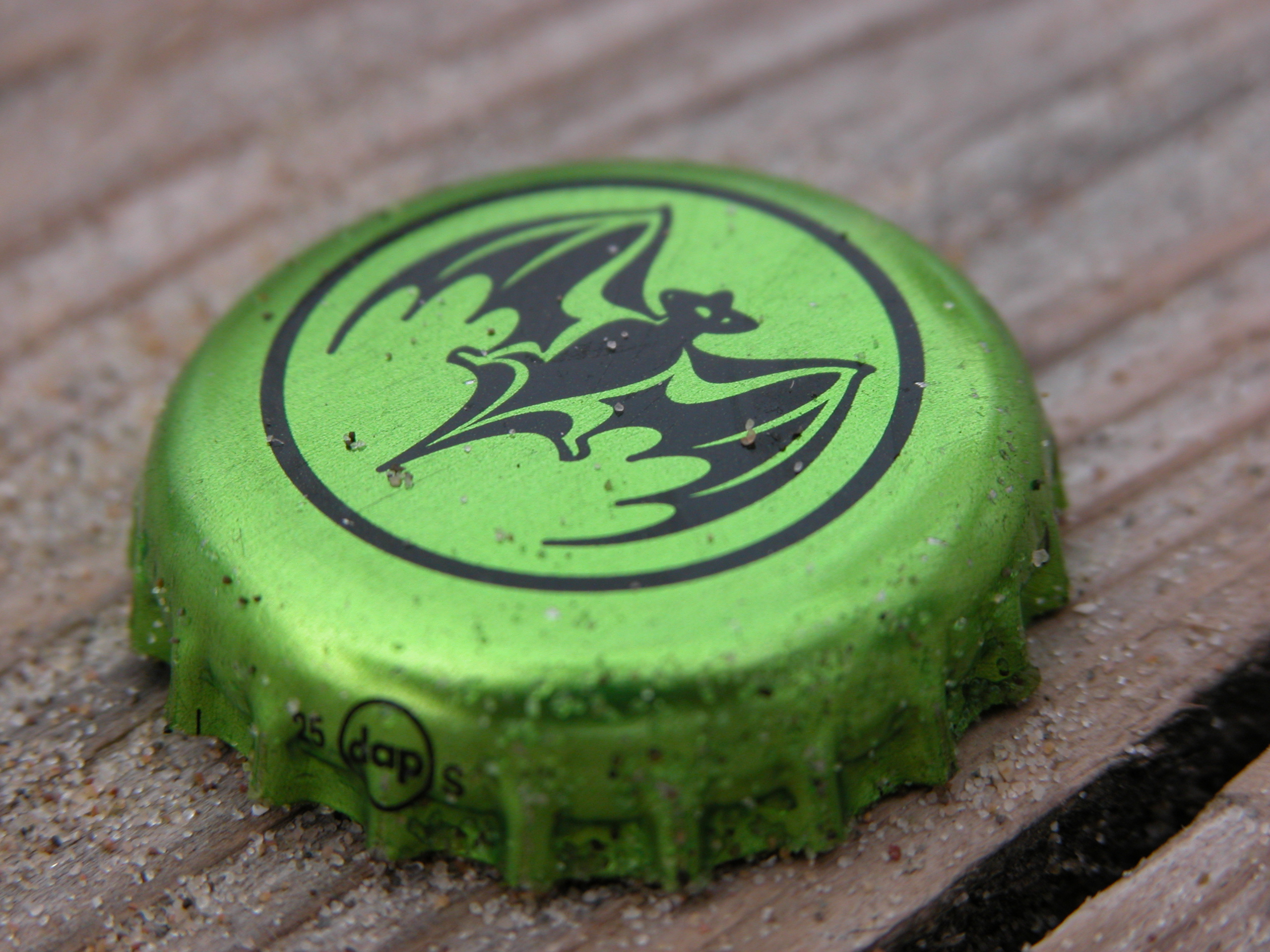 bat bottle cap green logo