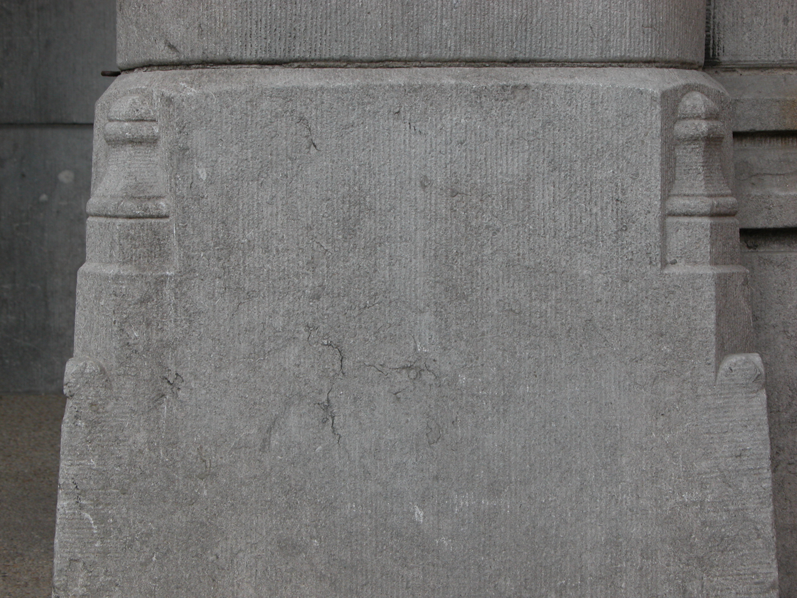 stone corner of a building grey