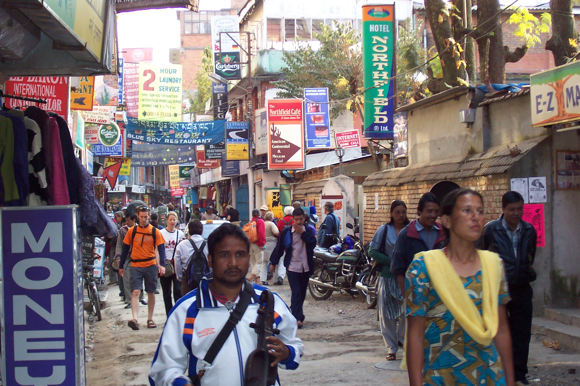 nature characters humanoids annet nepal streetscape cityscape tourist tourists musician people walking streets street market advertisement taxi crowd crowded shopping shoppingstreet