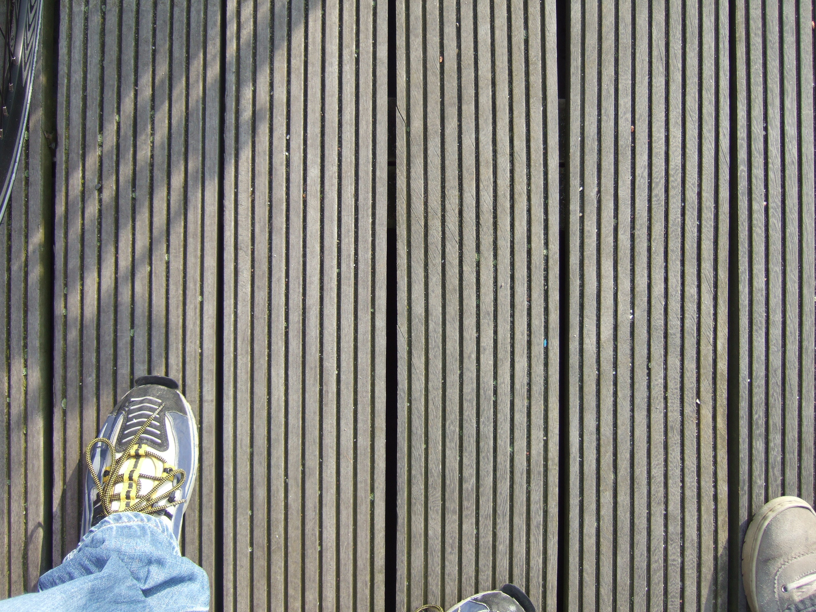tabus plank planks shoes feet boardwalk hi-res