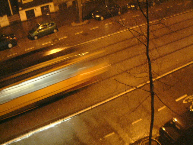 tram movement night city street blur light