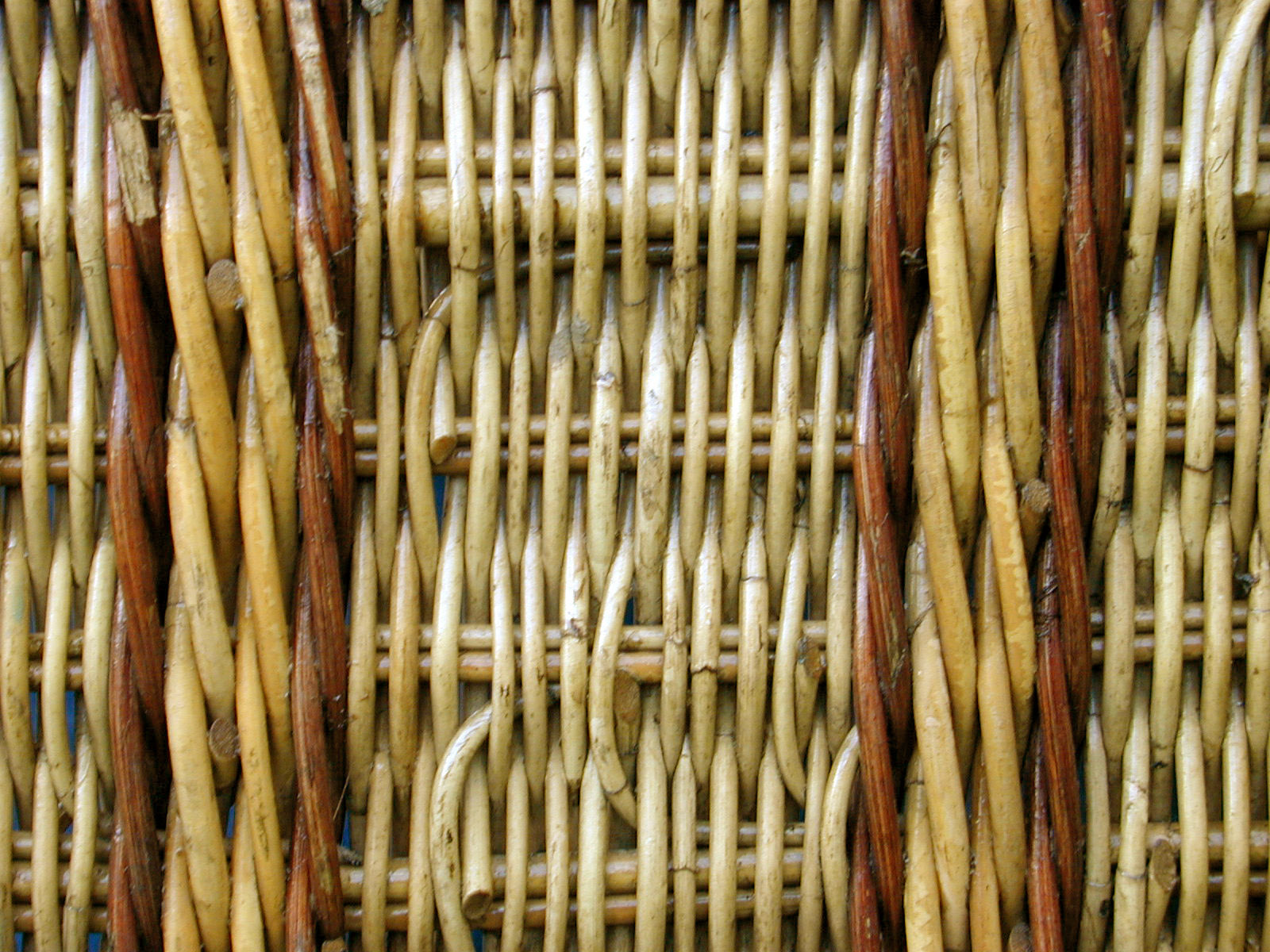 wicker basket woven wove straw straws twined intertwined brown