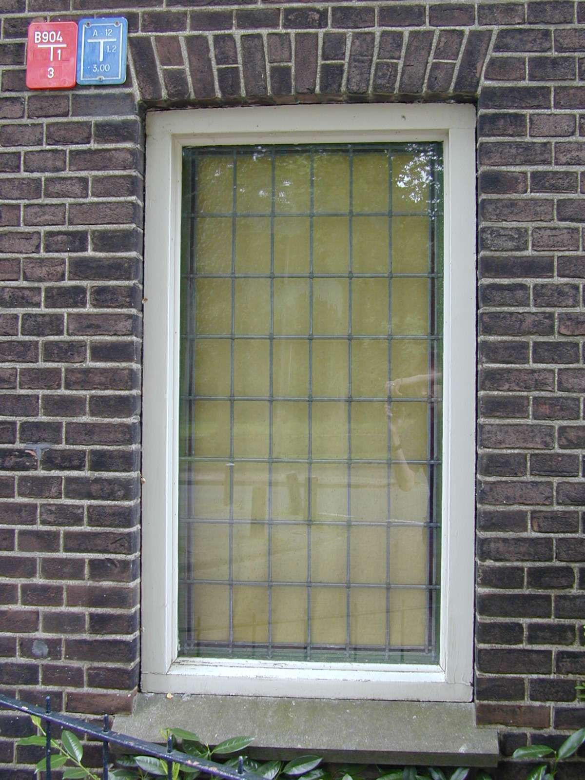 window bar bars wire wires wired square glass bricks boarded up