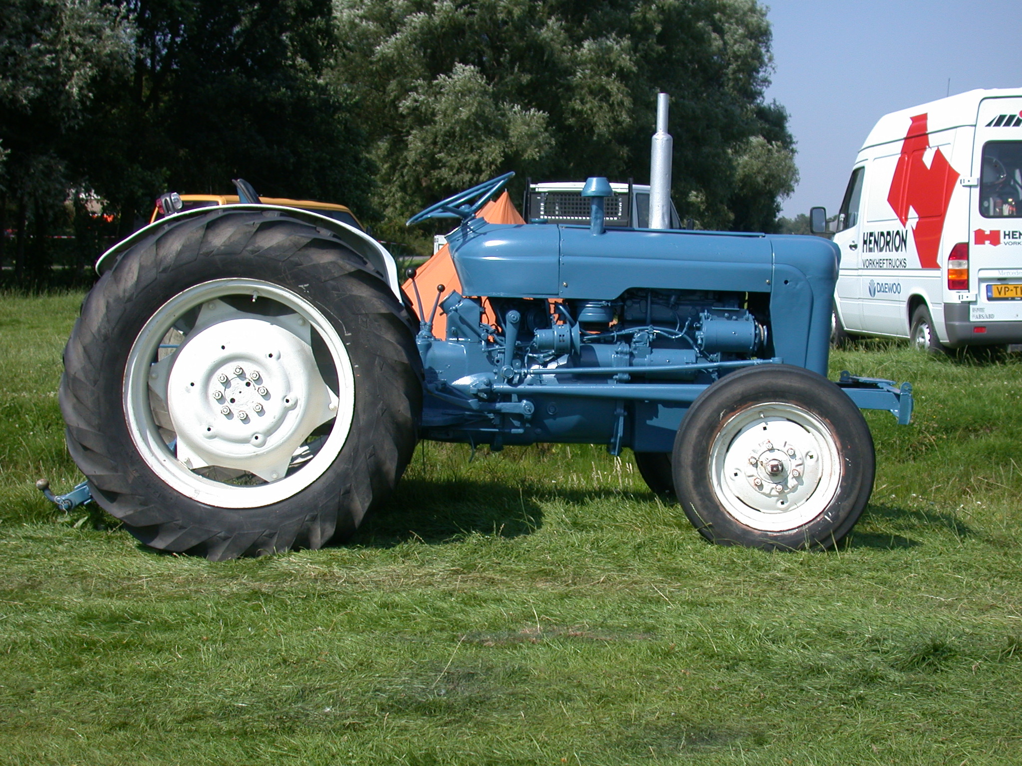 tractor blue big wheel wheels farm vehicle