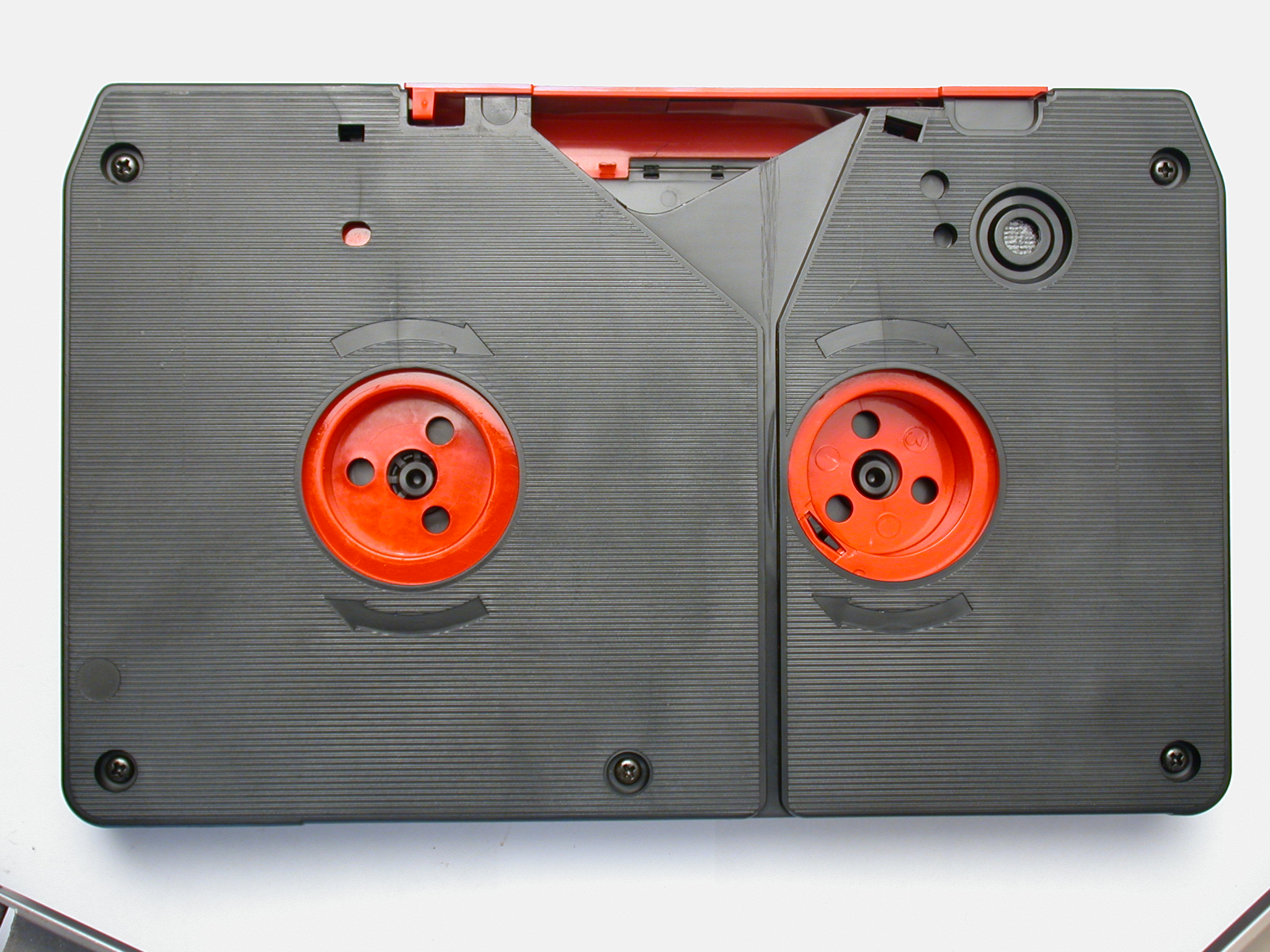 tape betacam betamax plastic betacamsp arrow texture side circle circles black red video videotape tape object