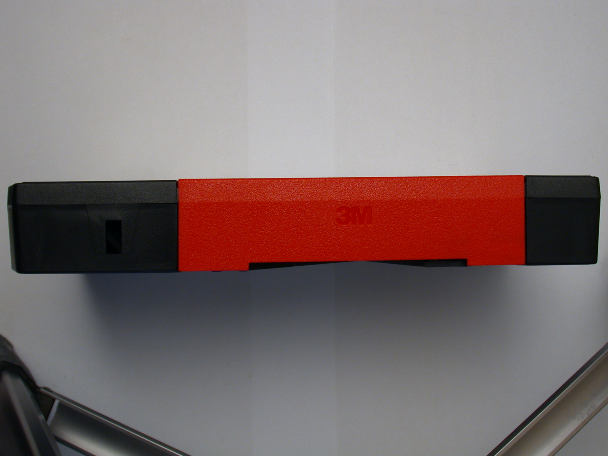 objects tape plastic videotape video betacam betamax red rectangle texture side