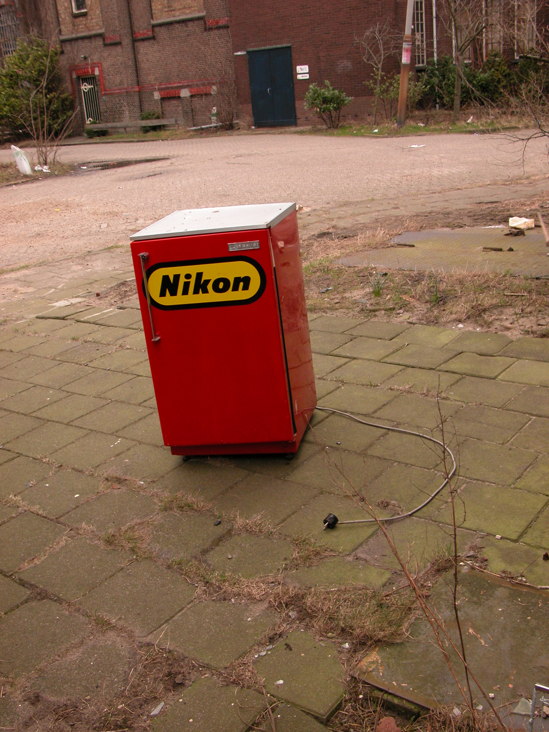objects household nikon fridge logo red