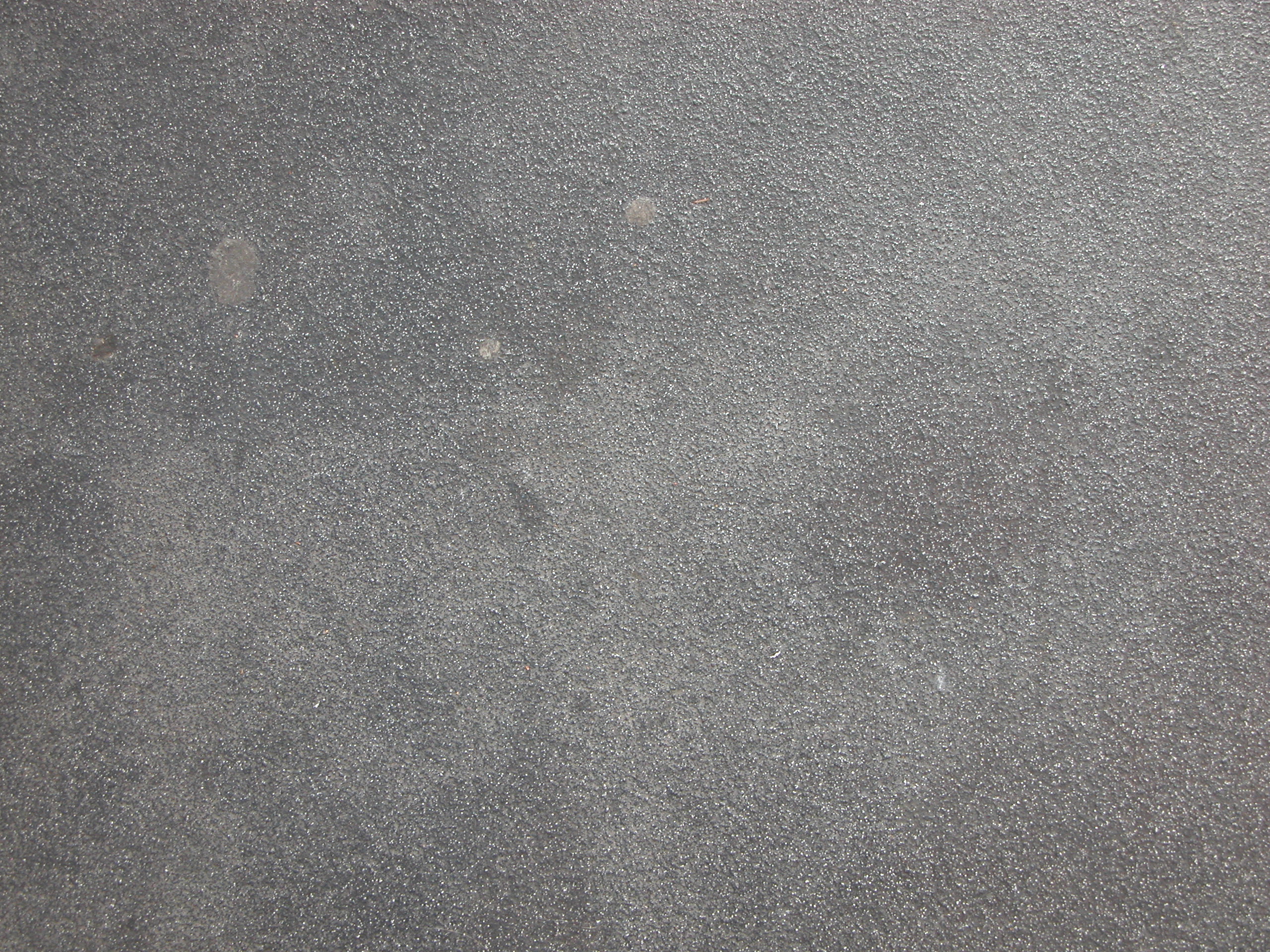 wall ground surface crisp bump bumps little grey gritty grit metal