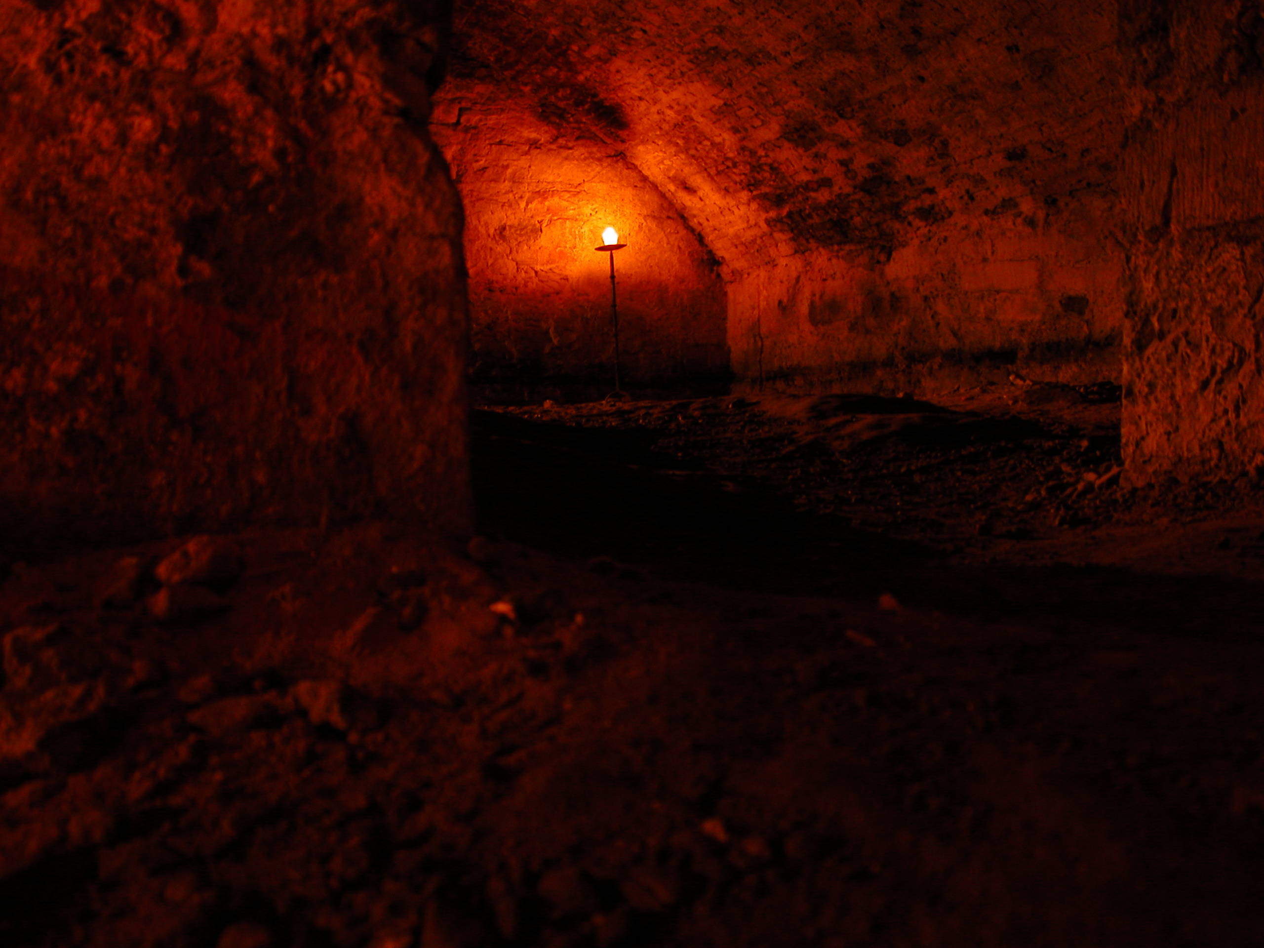 cave cavern grotto dar red golden glow lamp cut out cut-out of stone rock caves caverns