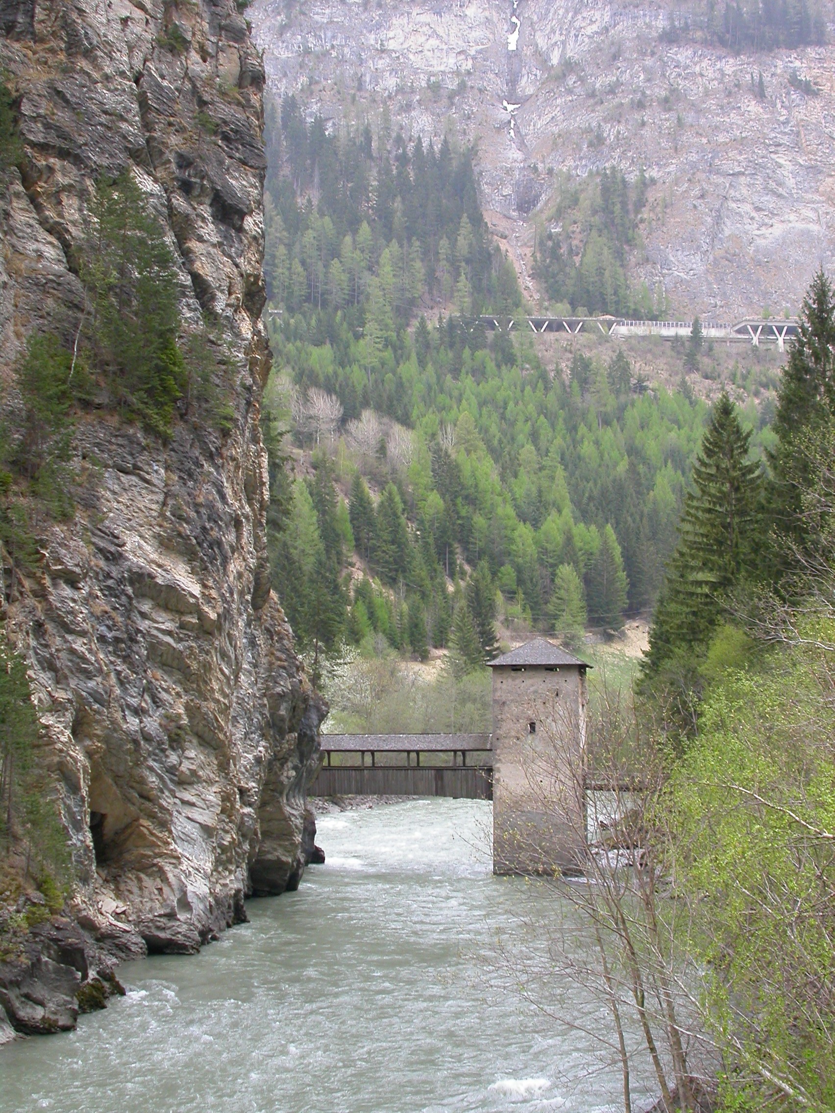 paul horstman old bridge crossing a river stone tower towers mountain mountainside mountains brook creek