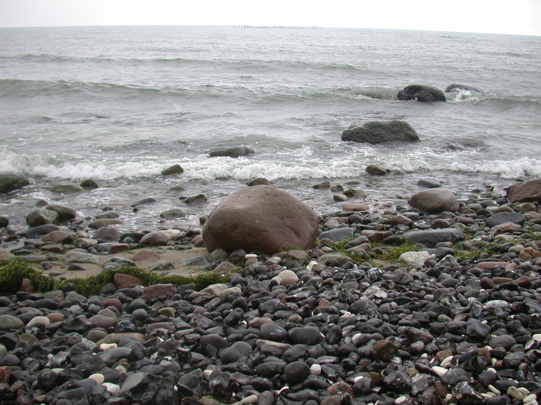 janneke shore stones boulder boulders gray sea waves pebbles