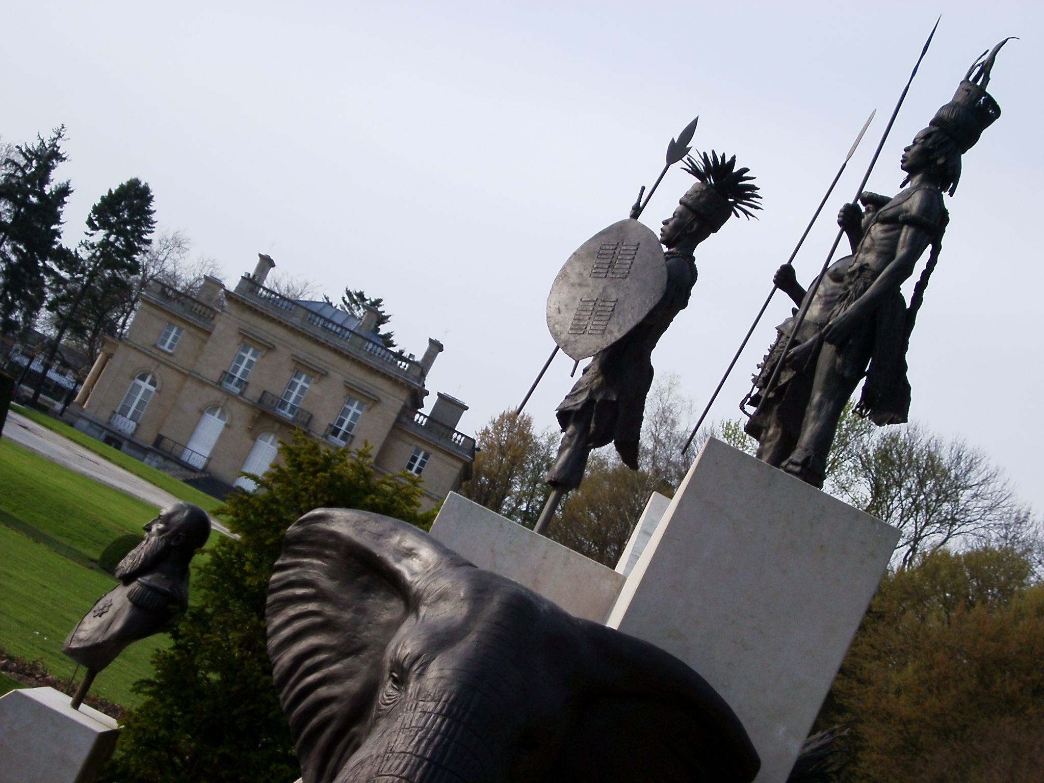 julien statue statues african warrior elephant bronze spears shields villa garden