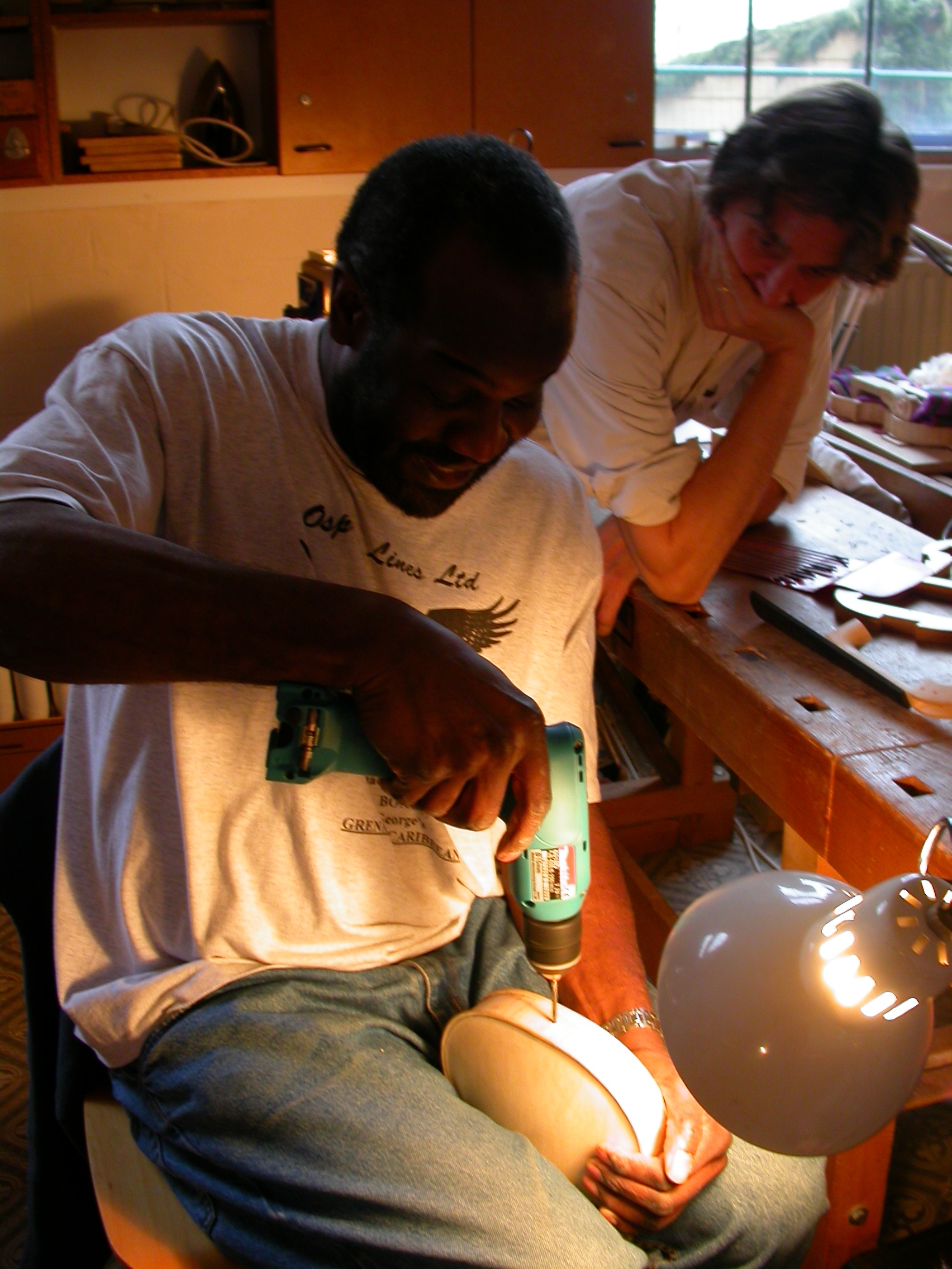 paul instrument makers craftsmen craft man drill crafting an music school