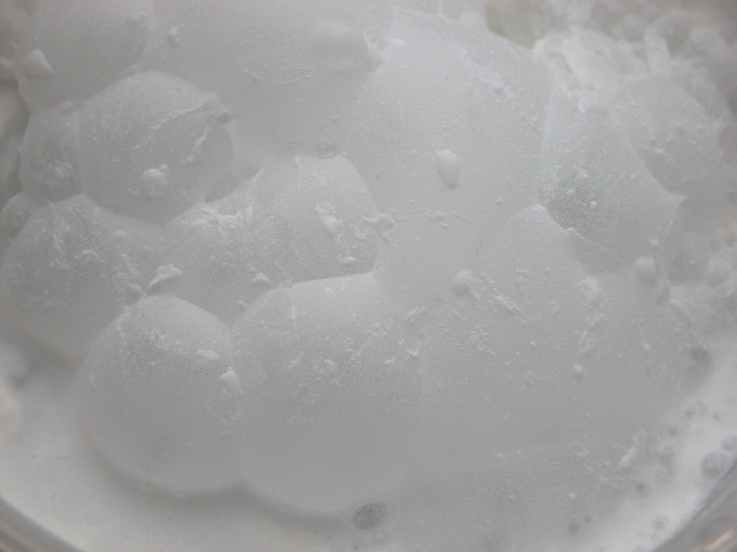 bubbles in milk (?) white