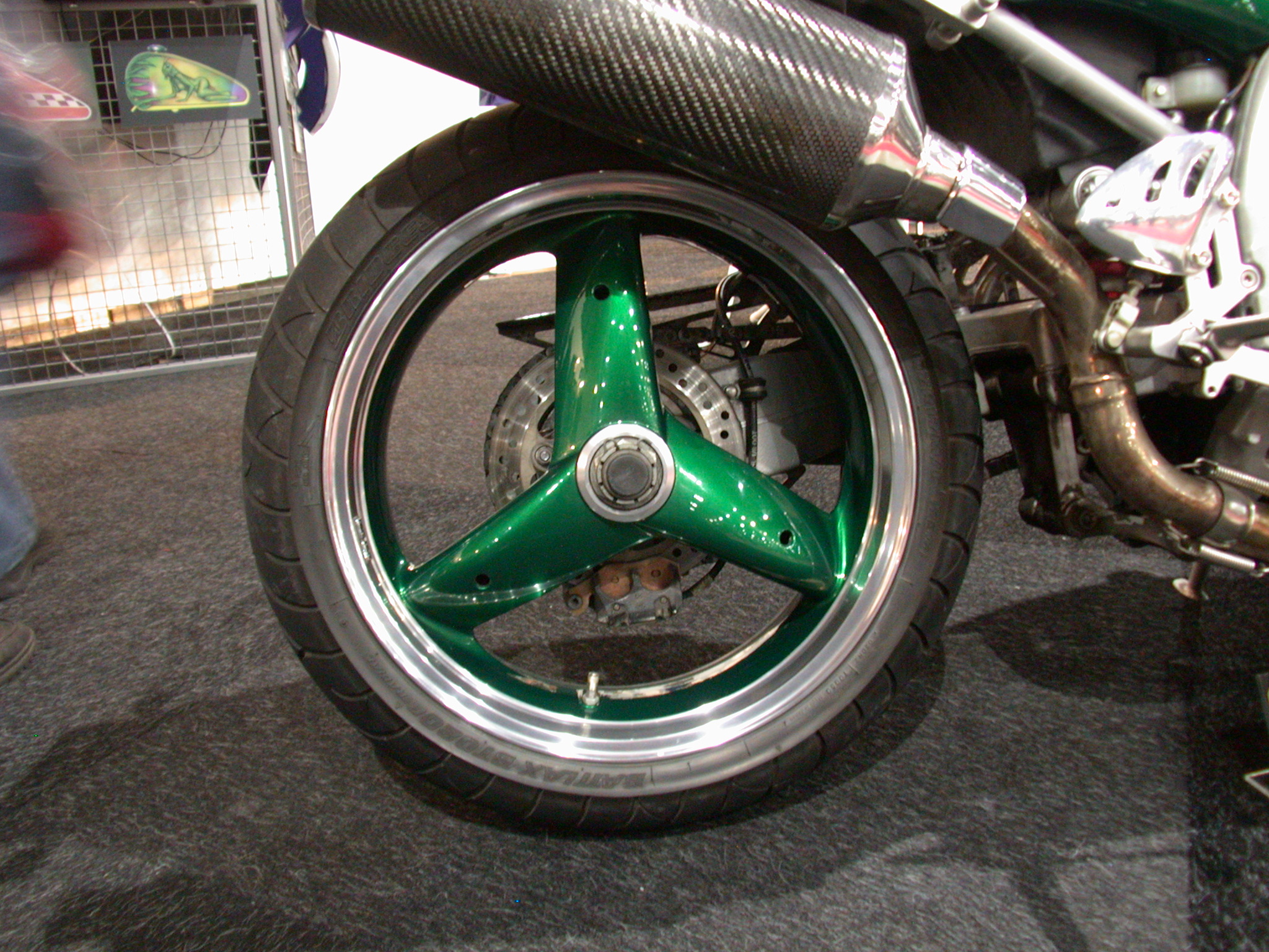scooter motor backwheel back wheel round spoke spokes green spoiler