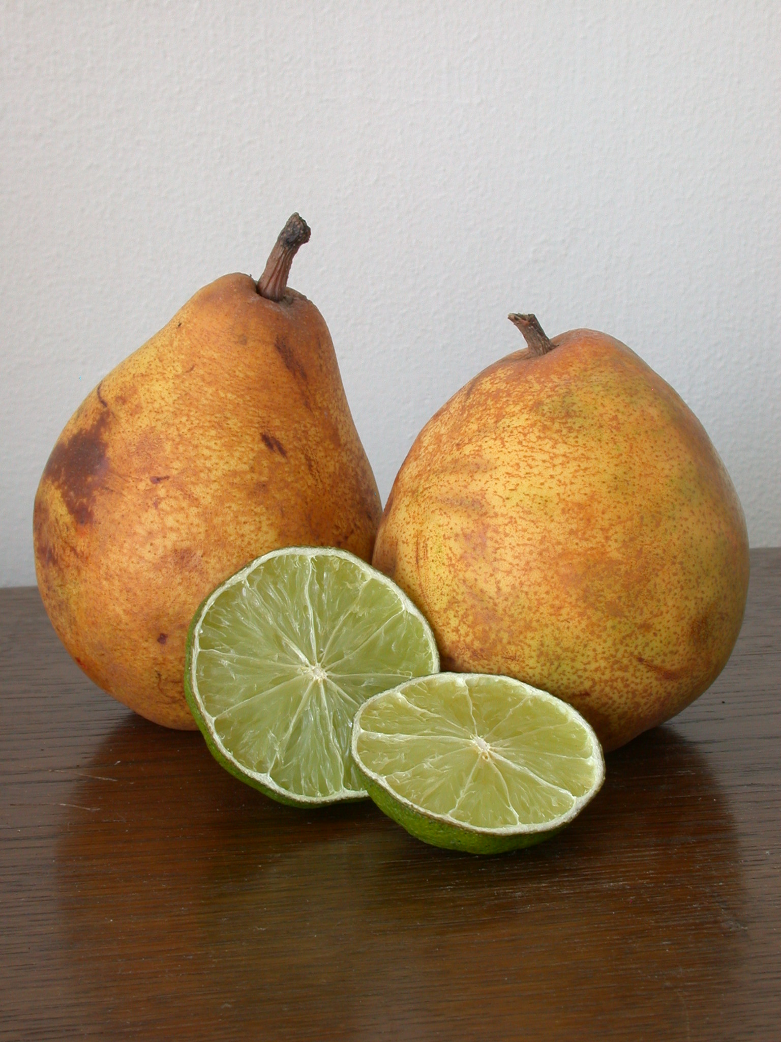 still live pear pears citrus lemon lime limes yellow fruit