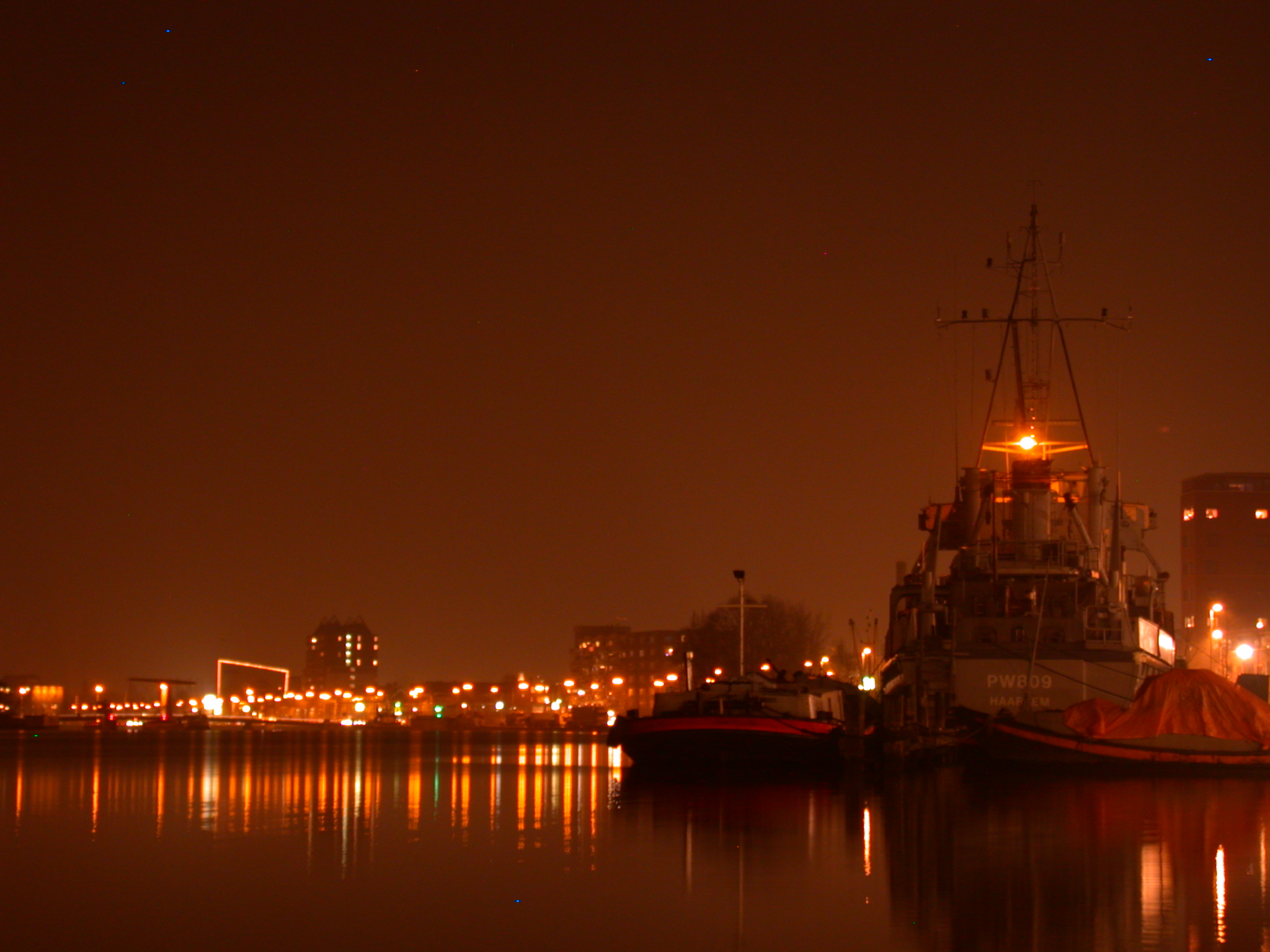 ship ships harbor night dark city sky