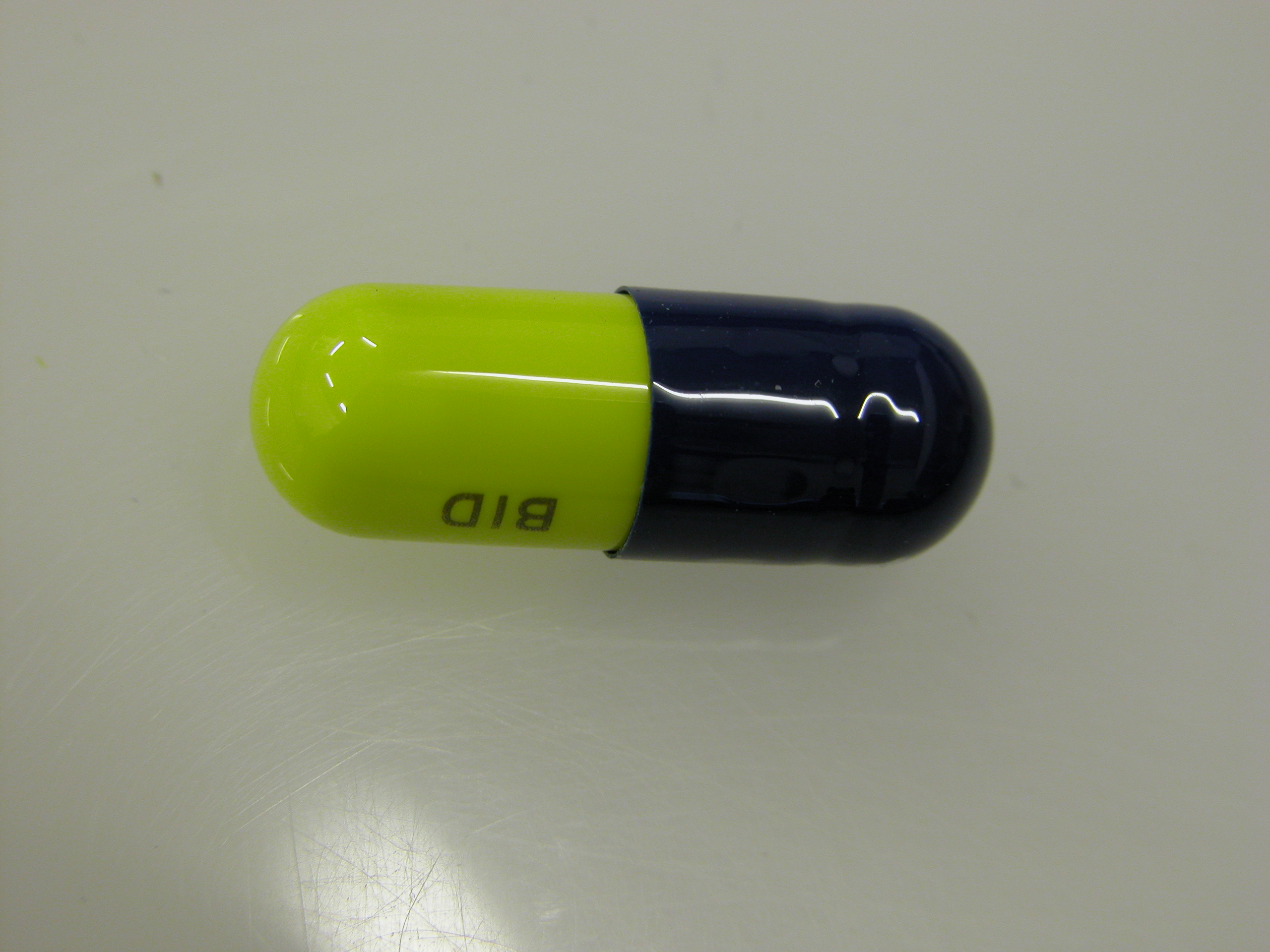 Image*After images pill medicine yellow blue capsule