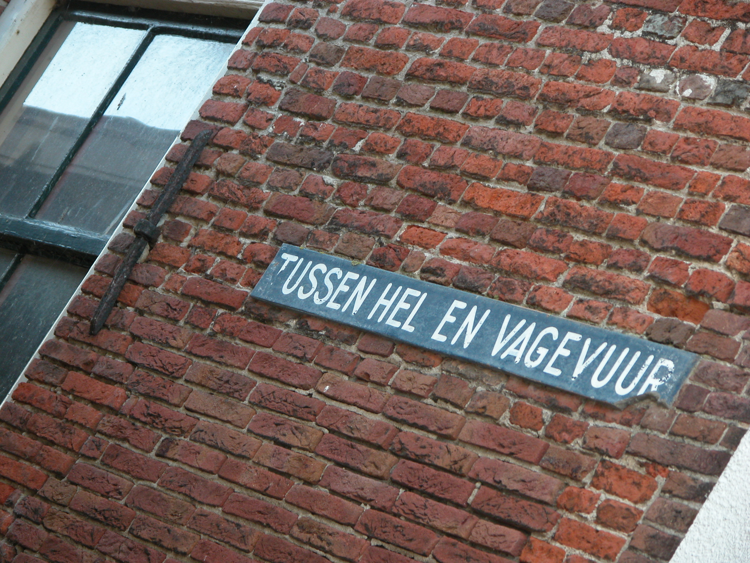 tussen hel en vagevuur sign street name streetname corner