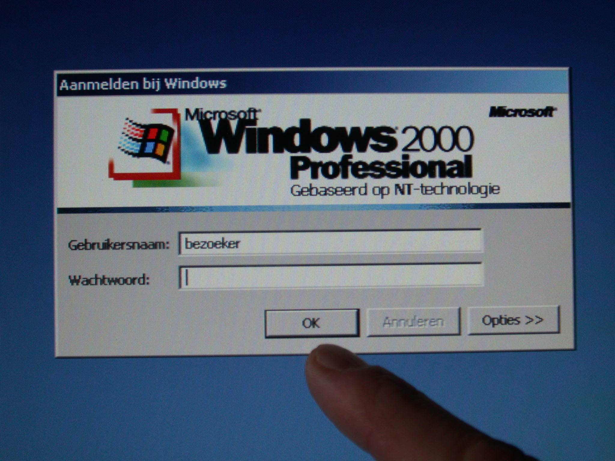 windows 2000 login screen finger touch screen logo microsoft