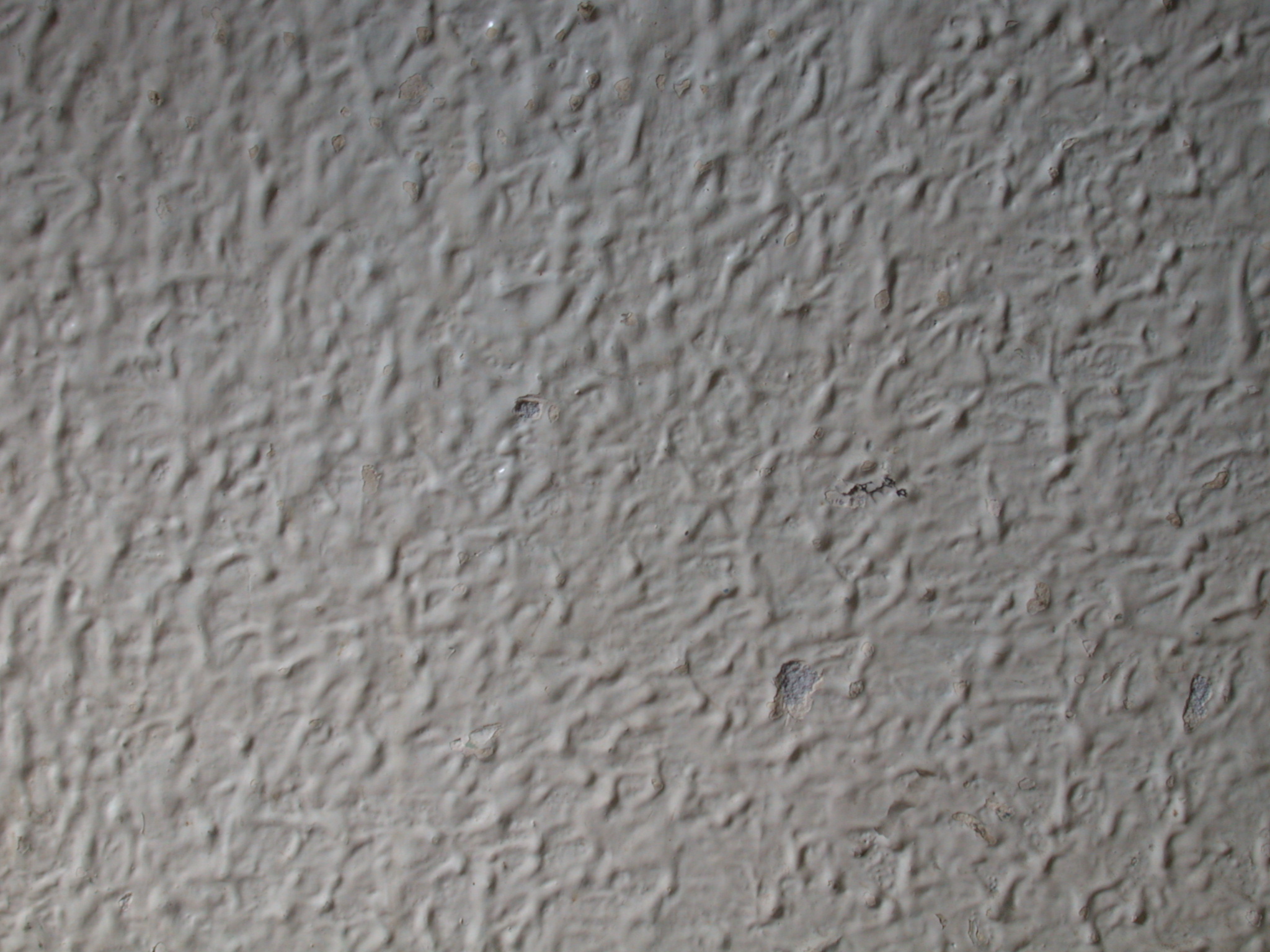 closeup of a painted wall noise bumps