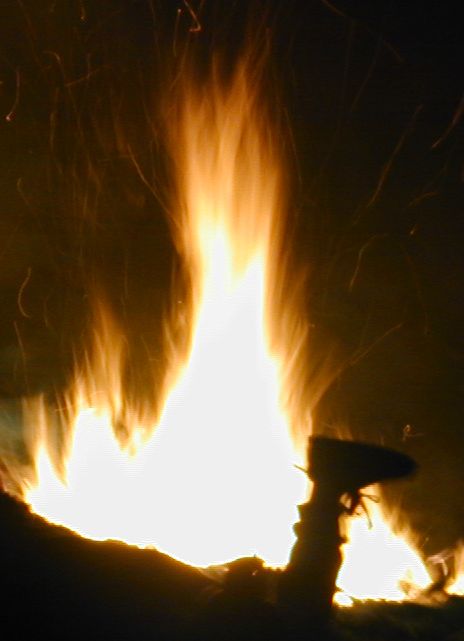 fire heat light bonfire leg foot feet burn burning darkness campfire