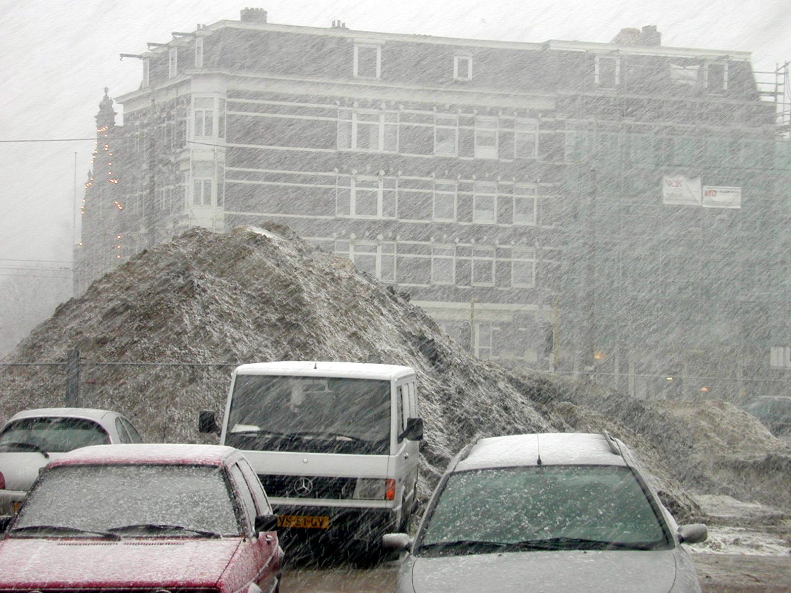 parkinglot winter snow snowing amsterdam pile sand city car cars hail cold