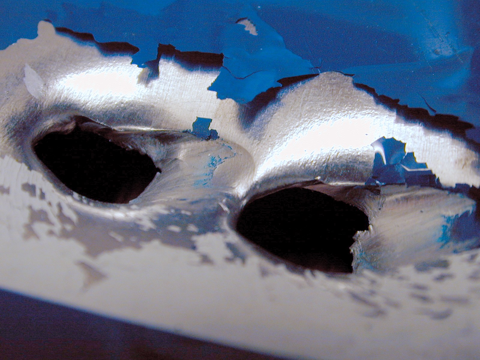 steel bulletholes holes bullet entries paint metal blue silver