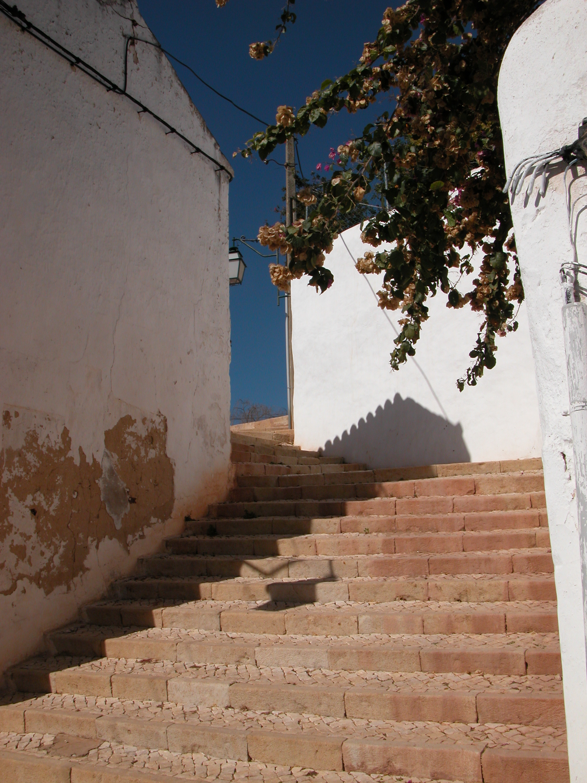 spanish stairs steps warm white walls greek