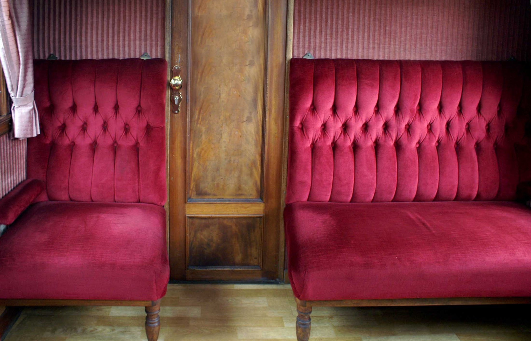 betina train interior red velvet sofas benches